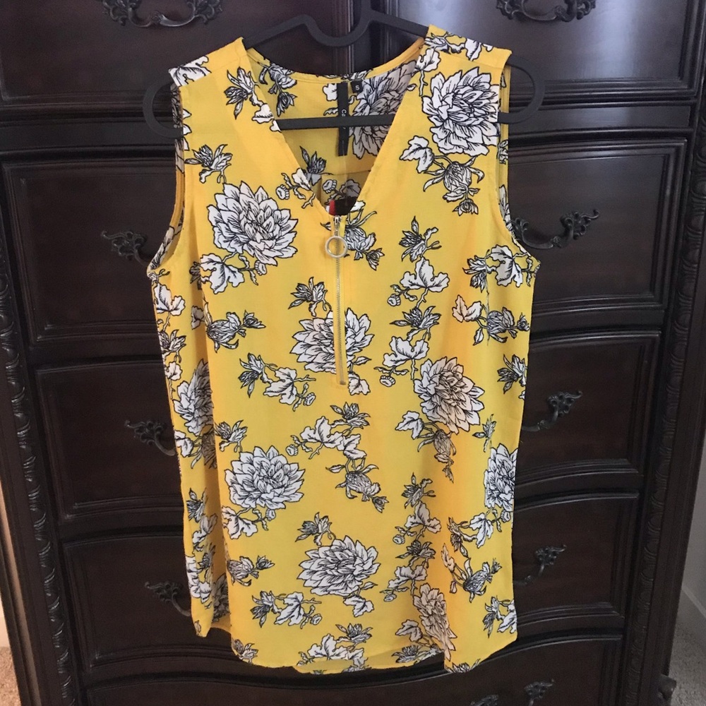 Yellow sleeveless blouse